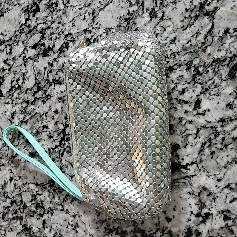 The cutest mini wristlet/lip stick bag!